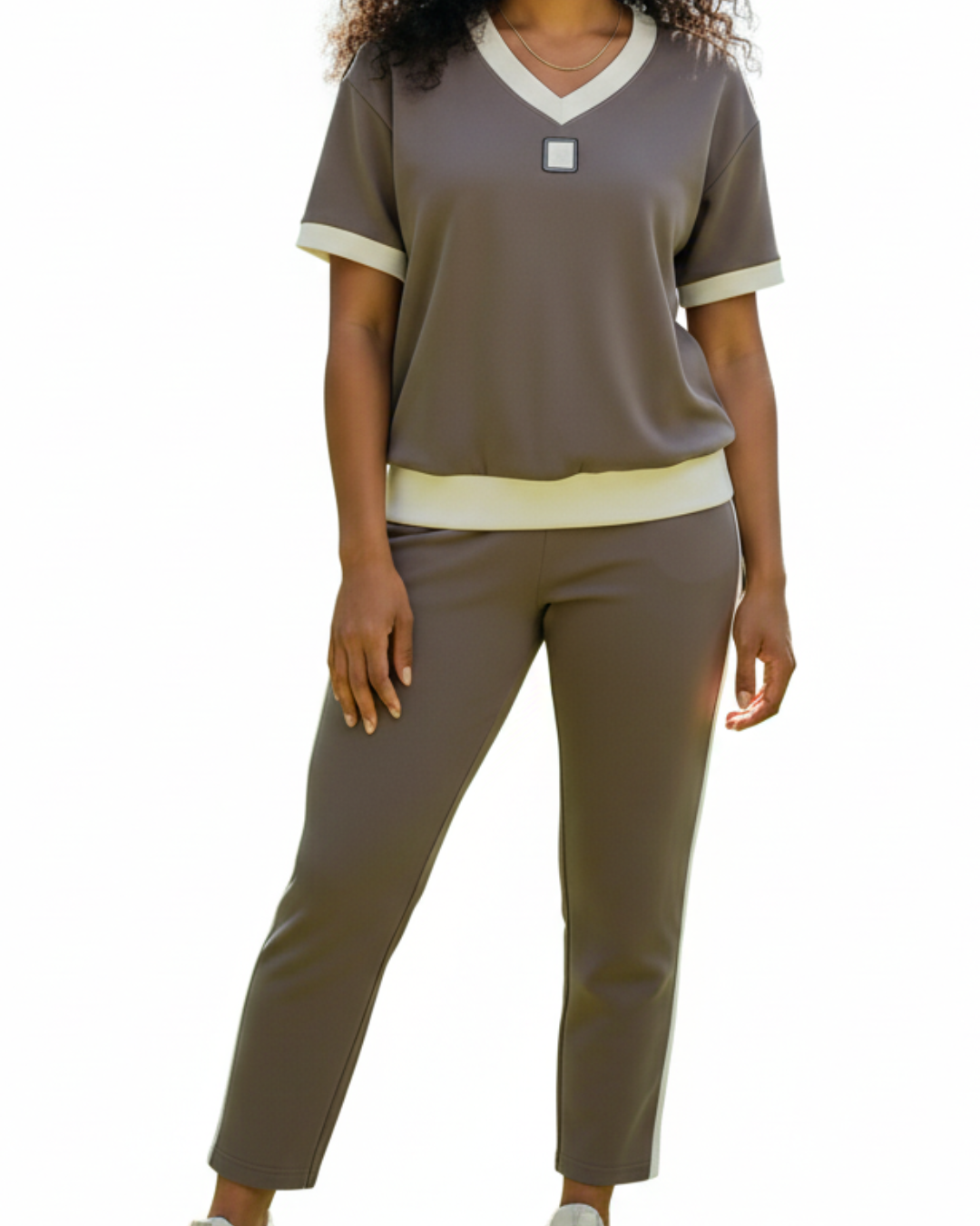 Conjunto elegante de top e calças com decote em VŸ