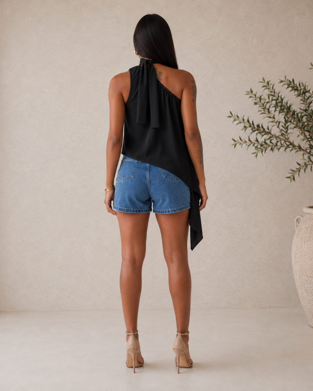 Blusa folgada assimétrica