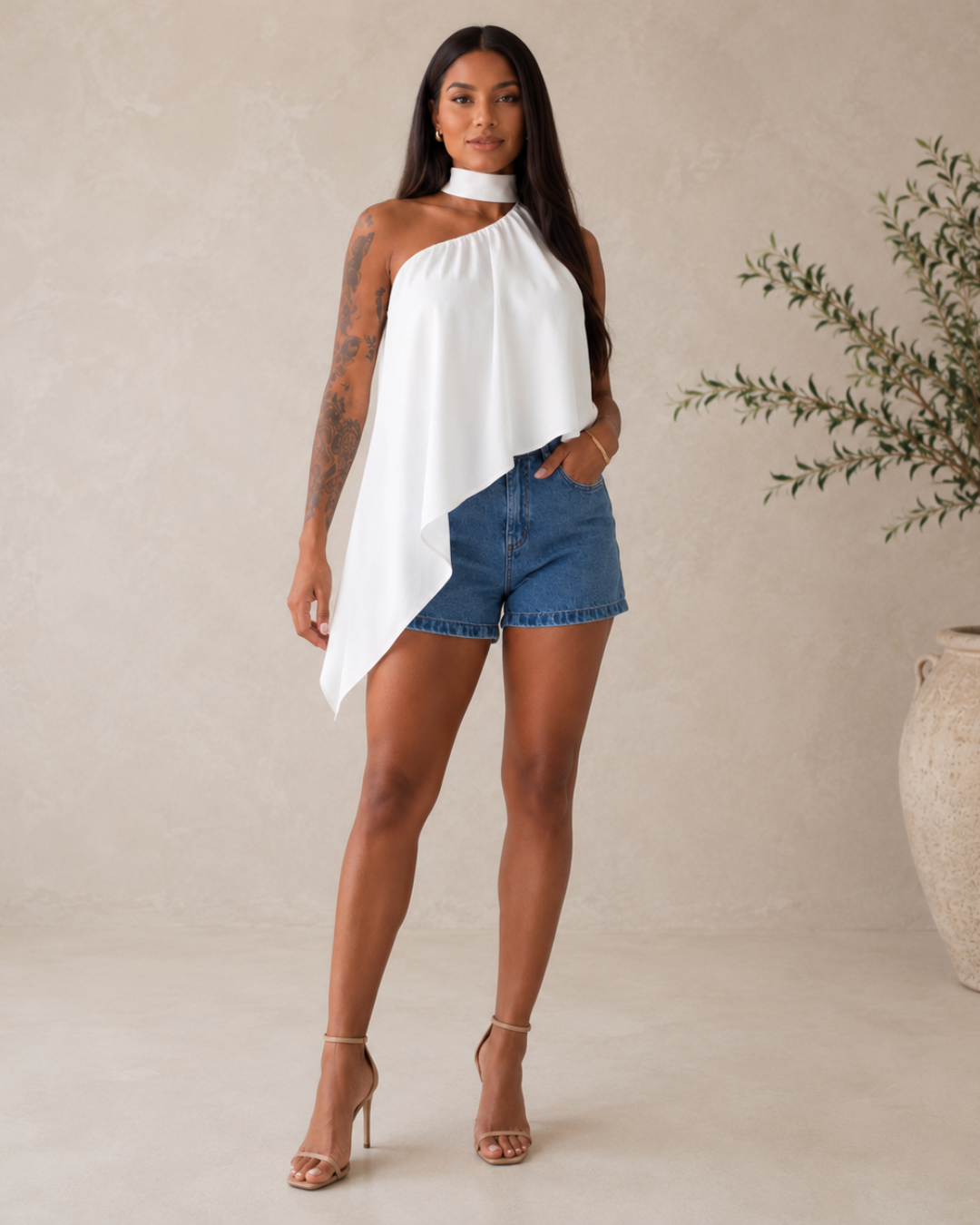 Blusa folgada assimétrica
